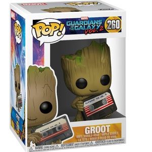 Baby Groot holding cassette tape